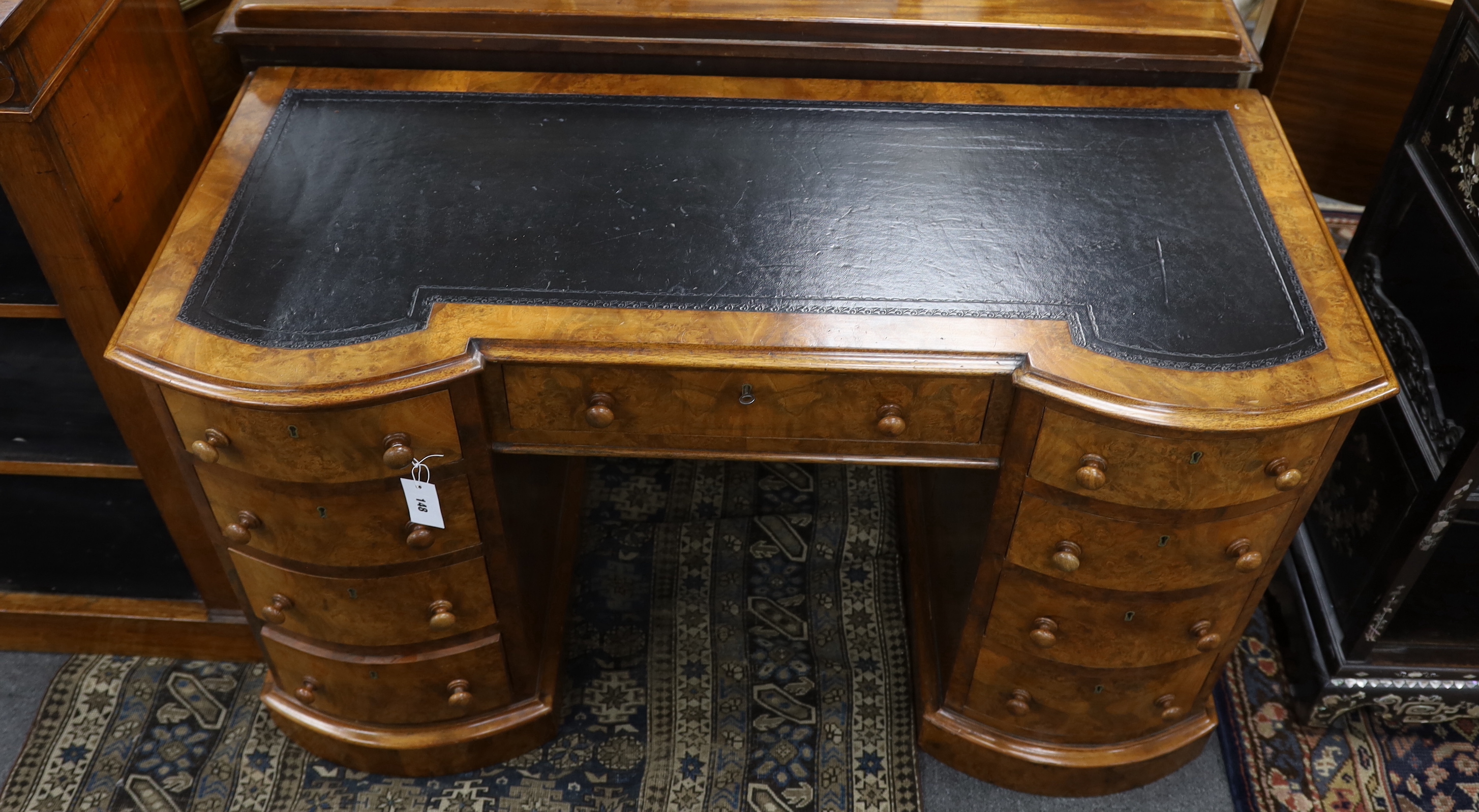 A Victorian burr walnut kneehole desk, width 119cm, depth 52cm, height 70cm together with an Edwardian inlaid low seat chair